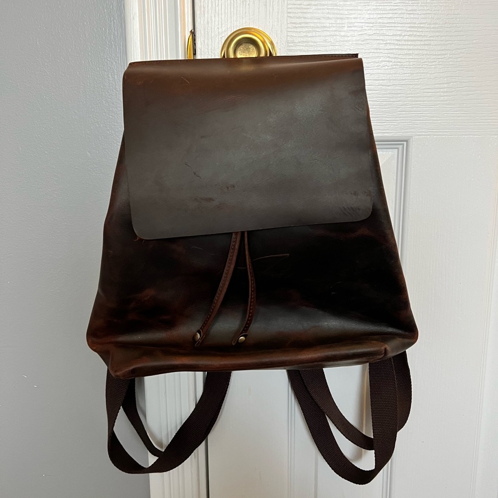 Beautiful deep brown leather backpack